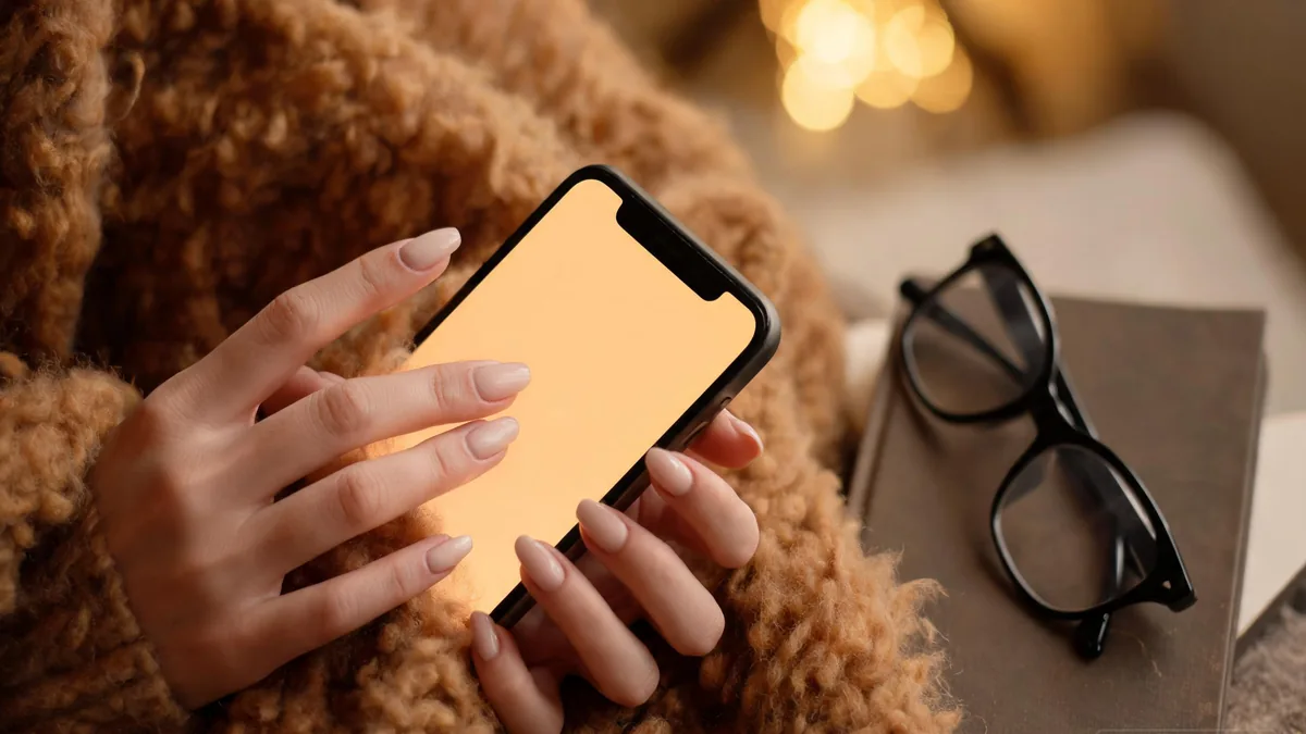 Megane AI girlfriend companion experienced through a chat app, with a thoughtful bookish presence any time you open your phone